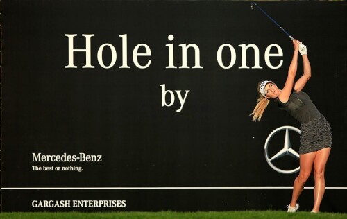 DUBAI, UNITED ARAB EMIRATES - DECEMBER 10:  Paige Spiranac of the United States plays her tee shot on the par 3, 15th hole during the second round of the 2015 Omega Dubai Ladies Masters on the Majlis Course at The Emirates Golf Club on December 10, 2015 in Dubai, United Arab Emirates.  (Photo by David Cannon/Getty Images)