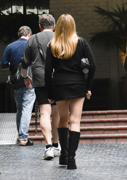 26 May 2025 - EXCLUSIVE.Margot Robbie is spotted heading to Chateau Marmont in Los Angeles. The new mom carried a Alaia handbag and wore a black mini dress with matching Acne Studios boots.Credit: GoffPhotos.com   Ref: KGC-339/TIDLA-15**UK Sales Only - No Daily Mail Group/No Sun Group - Exclusive - Newspapers Allrounder - Magazines Double Space Rates - Web/Online Must Call Before Use**