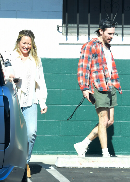 11/18/2024 EXCLUSIVE: Hilary Duff and Matthew Koma are all smiles exiting a studio in Los Angeles. The American actress wore a white blouse, jeans, and tan heels.sales@theimagedirect.com Please byline:TheImageDirect.com*EXCLUSIVE PLEASE EMAIL sales@theimagedirect.com FOR FEES BEFORE USE